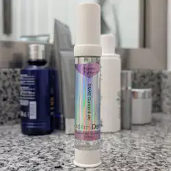 Bottle of Modern Derma on a bathroom counter.